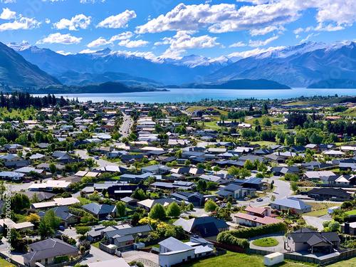 View of Wanaka Town Along Lake Wanaka With Southern Alps Mountain Panorama in New Zealand