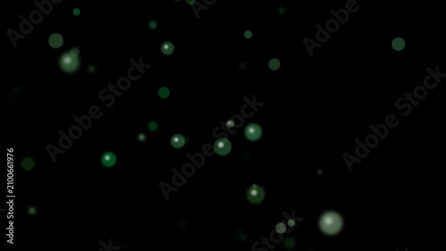 Glowing green and white particles floating.
