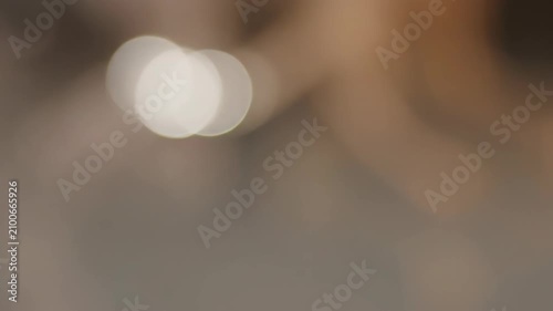 Abstract Background with Soft Bokeh Light Orbs and Cinematic Out of Focus Warm Tones for Creative Design Projects