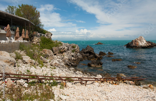 Beautiful rocks, beach and restaurant on seashore in village Tulenovo in Bulgaria