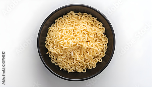 Close up view shows instant noodles poured into black bowl before preparation