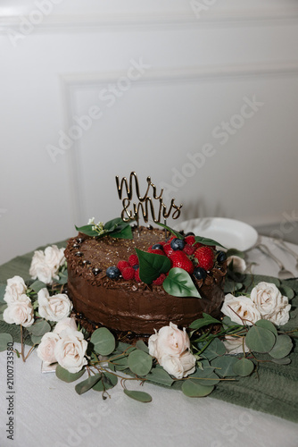 Chocolate Wedding Cake with Florals and Fruit