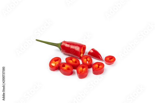 Red chili pepper isolated on white background. Fresh slice of hot pepper. Vegan, vegetable. Pepper cut into slices on a white background close-up.