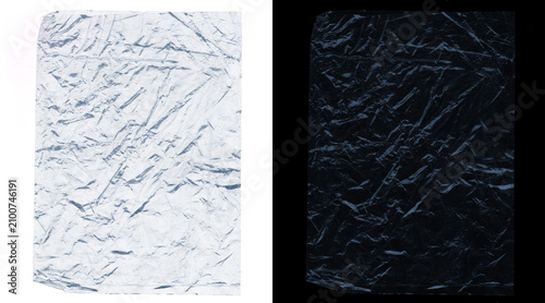 Photos Crumpled plastic wrap texture on black and white backgrounds, wrinkled transpare