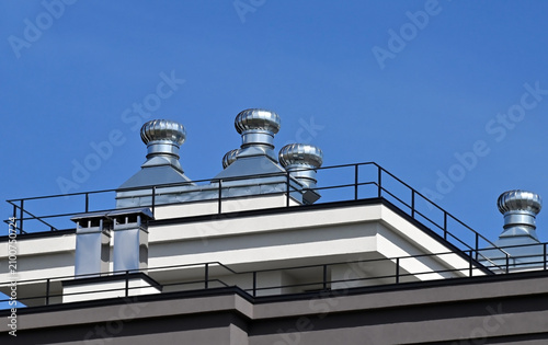Cuadro en lienzo Steel ventilation funnel and turbine rooftop vent cap