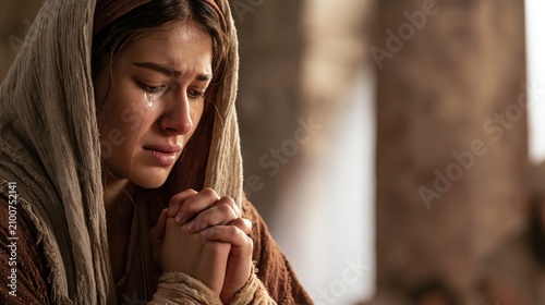 Hannah praying earnestly in the tabernacle with tears in her eyes and longing for a child.