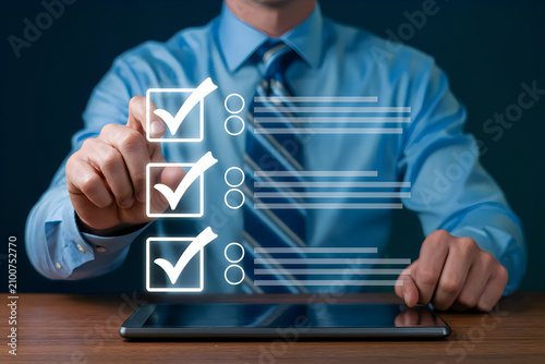 Businessman using a digital tablet to interact with a checklist