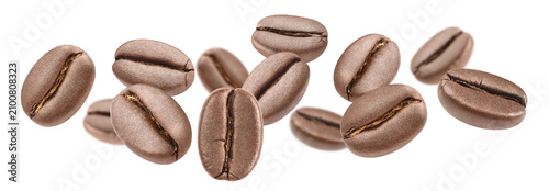Картината върху платно Fresh roasted coffee beans scattered in weightless motion, isolated on transpare