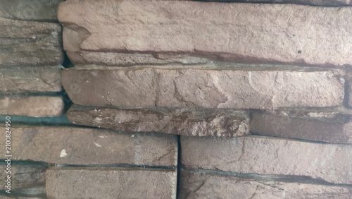 Earthy Stacked Stone Wall Texture for Modern Architectural Background Website Banner and Hero Header Wide Background with Authentic Minimalism and Organic Design Space.
