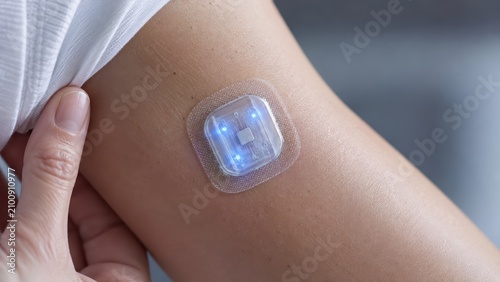 Wearable Medical Sensor Patch on Skin for Digital Health Monitoring Photo
