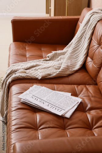Stack of daily newspaper an...