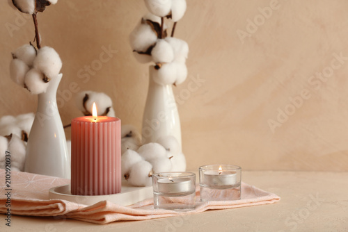 Pink ribbed pillar candle a...
