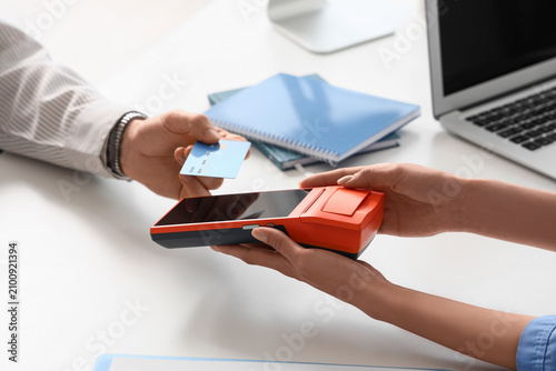 Male hand with credit card ...