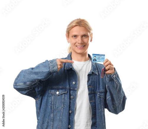 Happy young man pointing at...