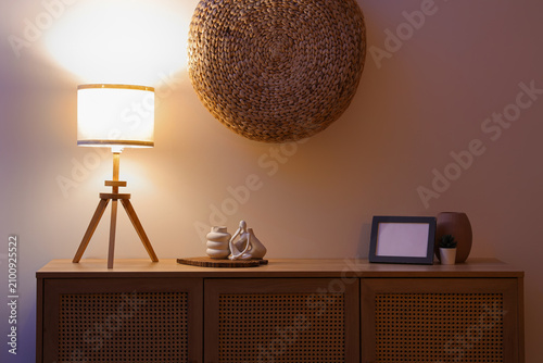 Glowing lamp with blank fra...