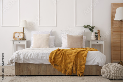 Interior of light bedroom w...