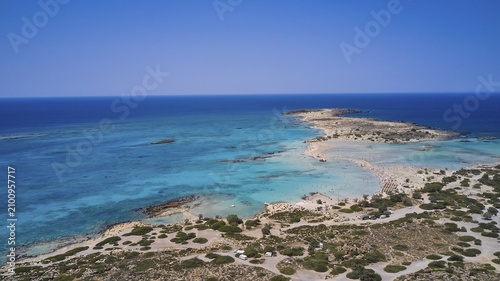 Overtourism, tourists on the beach, parasols, A sandy coast with turquoise sea, a popular nature holiday destination, Elafonissi, lagoon, south-western tip of Crete, Crete, Greek islands, Greece