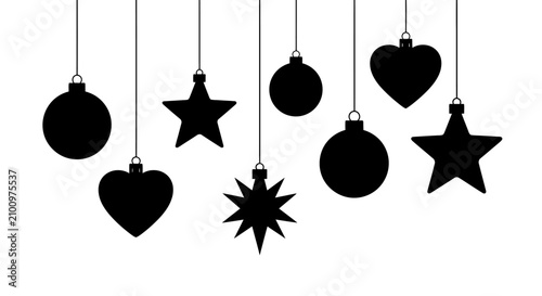 Black christmas ornaments hanging on strings with strings white background silhouettes christmas decorations holiday shapes hearts stars with balls