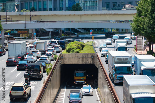 A cityscape of traffic jam at the urban city street in Tokyo telephoto shot