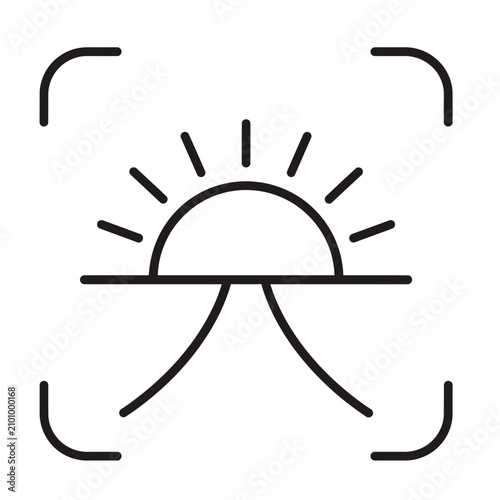 Icon of sunrise over mountain range at dawn with icon symbol