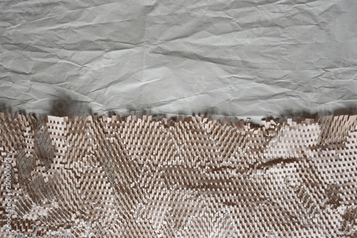 Honeycomb paper wrap and wrinkled kraft paper background, sustainable packaging material with copy space for text, eco-friendly delivery concept.