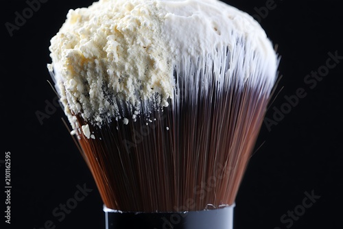 Dirty makeup brush with bristles spread out