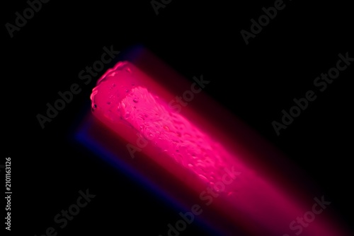 Pink glowing cylinder with light effect