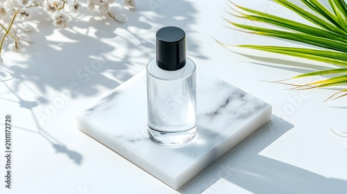 Minimalist cosmetic serum bottle on marble with botanical shadows