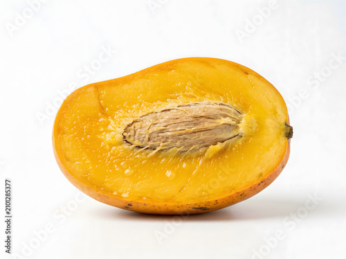 Mango Cross Section Showing Inner Flesh and Seed Isolated on White Background