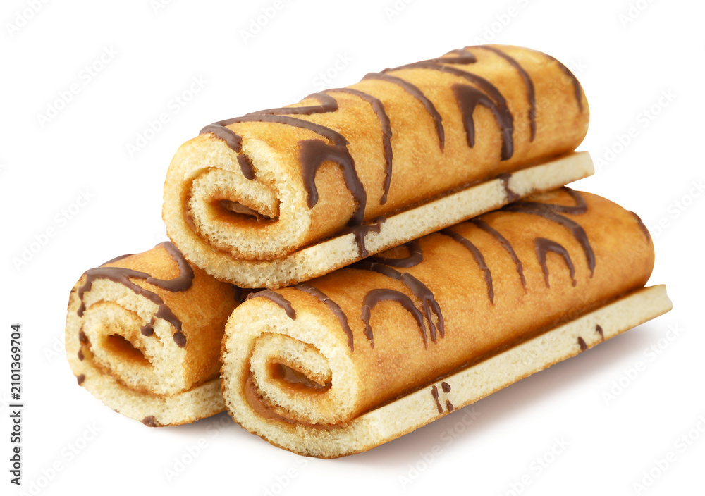 Fototapeta premium Pile of biscuit rolls close-up on a white background. Isolated