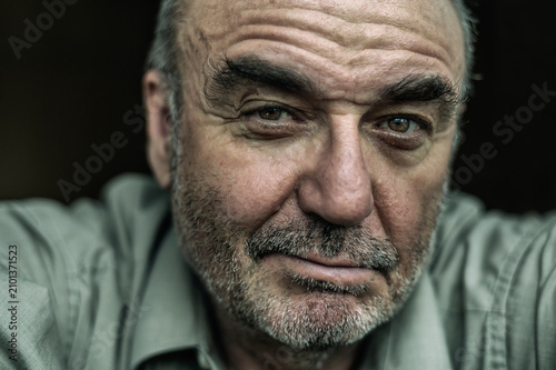 Portrait of sceptical senior man