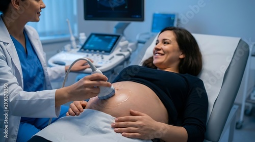 Pregnant woman having an ultrasound scan in a medical clinic