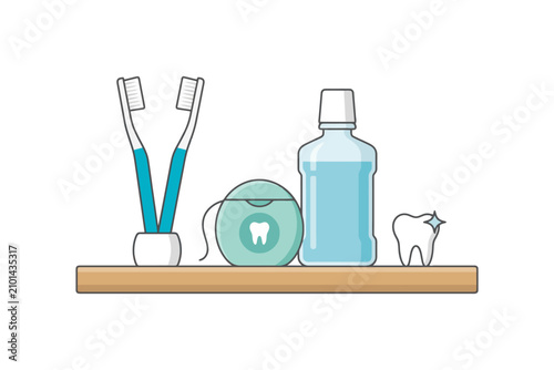 Oral care essentials: toothbrushes, floss, and mouthwash on shelf.