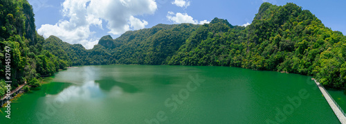 Принти на полотні Panoramic aerial drone view of calm green lake scenery at Dayang Bunting Lake in