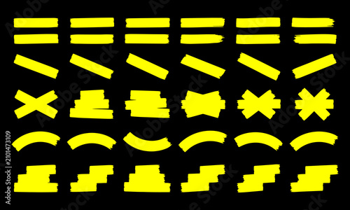 Set of yellow highlighter pen marks and brush strokes on a black background vector