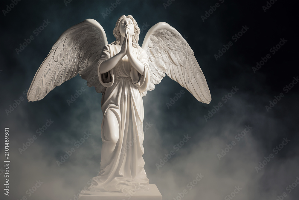 Fototapeta premium A marble angel statue stands with hands clasped in prayer beneath a moody sky. Spiritual guardian of faith, devotion, hope, protection, memorial, serenity and religious art. Funeral, burial.