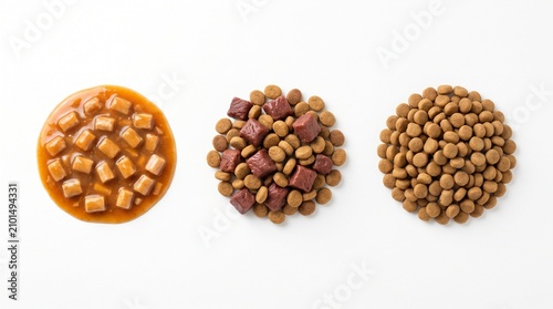 Pet food variety on white background, dry kibble and wet canned food, animal nutrition concept
