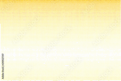 Фотография Golden halftone gradient pattern with diminishing density a vector background
