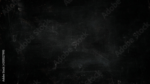 Bild auf Leinwand Scratched and worn dark surface with scratches and marks everywhere over time