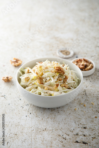 Cabbage salad with celery and walnut