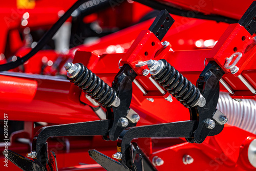 Obraz na plátně Agricultural machinery suspension tension springs on heavy frame