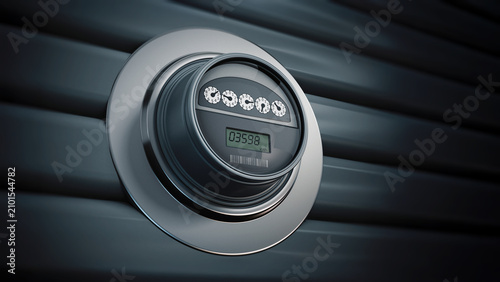 Фотография Electric meter with LCD panel hanging on the wall