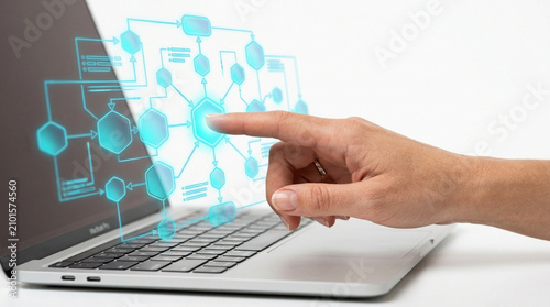 Modern laptop displaying a glowing blue network diagram with a human hand interacting, depicting digital innovation, data flow, and connectivity for technology, business solutions, and future