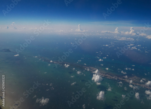 Subtropical Archipelago: High-Altitude Aerial View of the Florida Keys and Oversea Highway from an Airplane Window