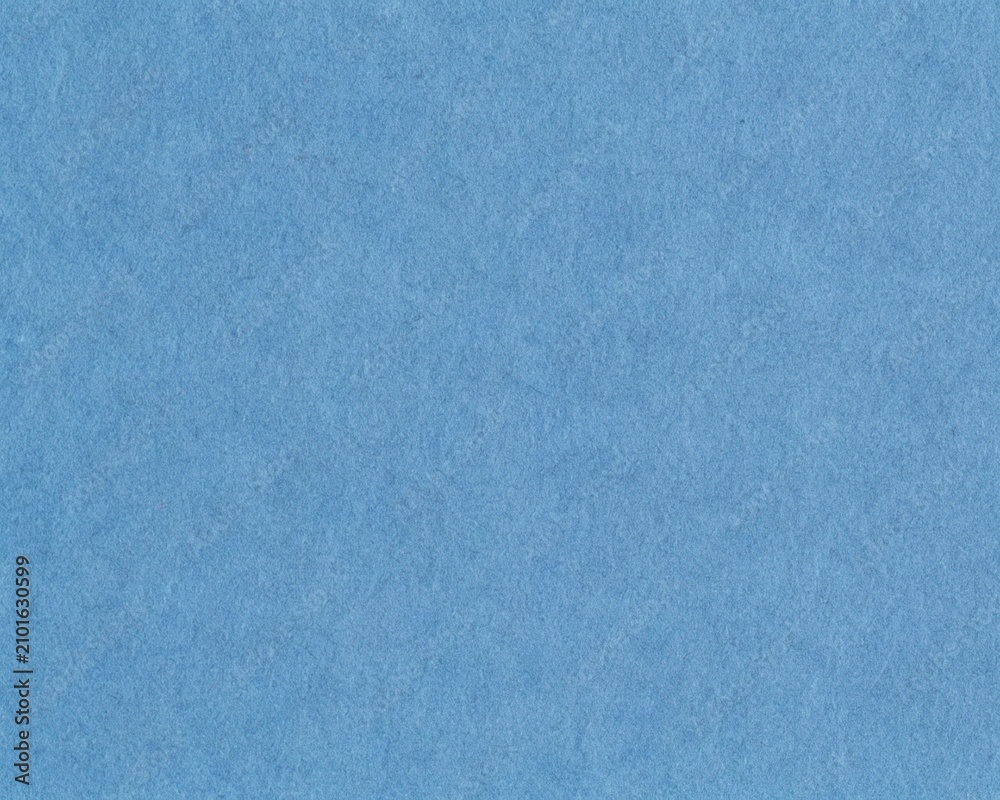 Naklejka premium Blue recycled craft paper texture with natural cardboard fibers, blank eco-friendly background featuring subtle grain and realistic details, for packaging, branding, stationery and creative design