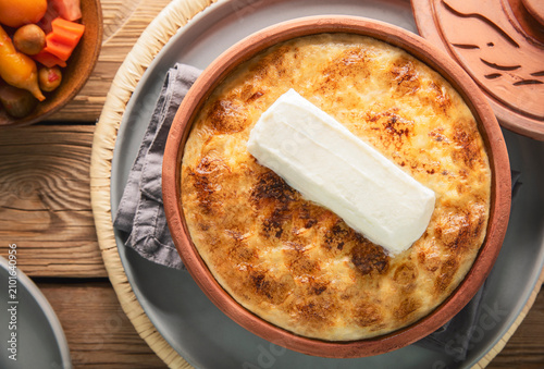 Arabic Cuisine; Egyptian baked rice ''Muammar Rice''. It's combination of rice, cream and milk. Topped with piece of fresh clotted cream.