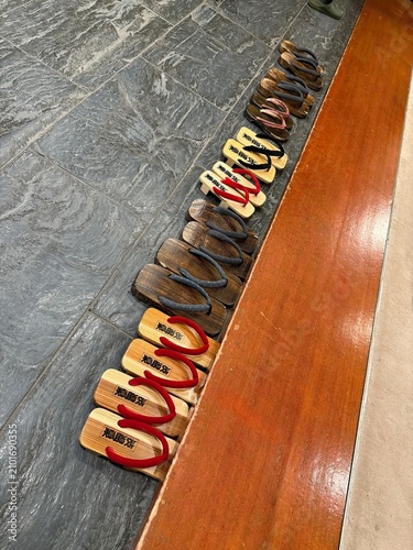 Wooden slippers in a row on the floor,
Japanese, onsen, 
