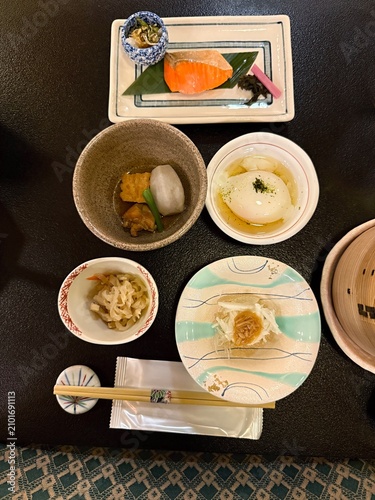 Japanese style ceramic bowl with chopsticks on a table in a restaurant