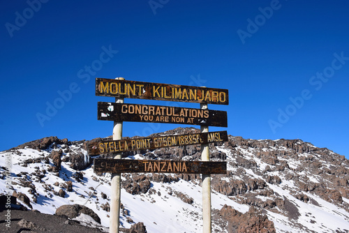 Historic Stella Point sign on Mount Kilimanjaro at 5,756 meters above sea level, marking a major milestone on the summit route in Tanzania.