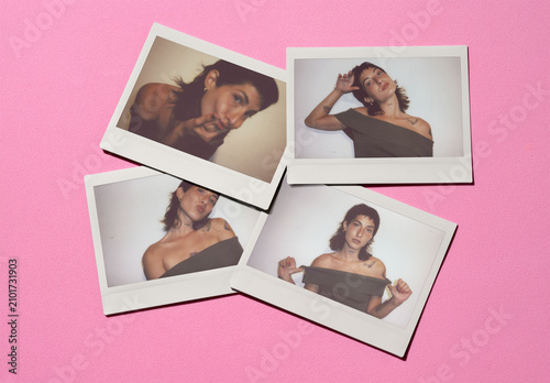 Mockup of Four blank polaroids placed on a pink background